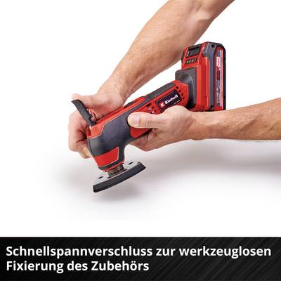 Ein Mann hält ein rotes Mehrzweckwerkzeug mit Schnellspannverschluss in den Händen. Unten steht der Text: 'Schnellspannverschluss zur werkzeuglosen Fixierung des Zubehörs'.