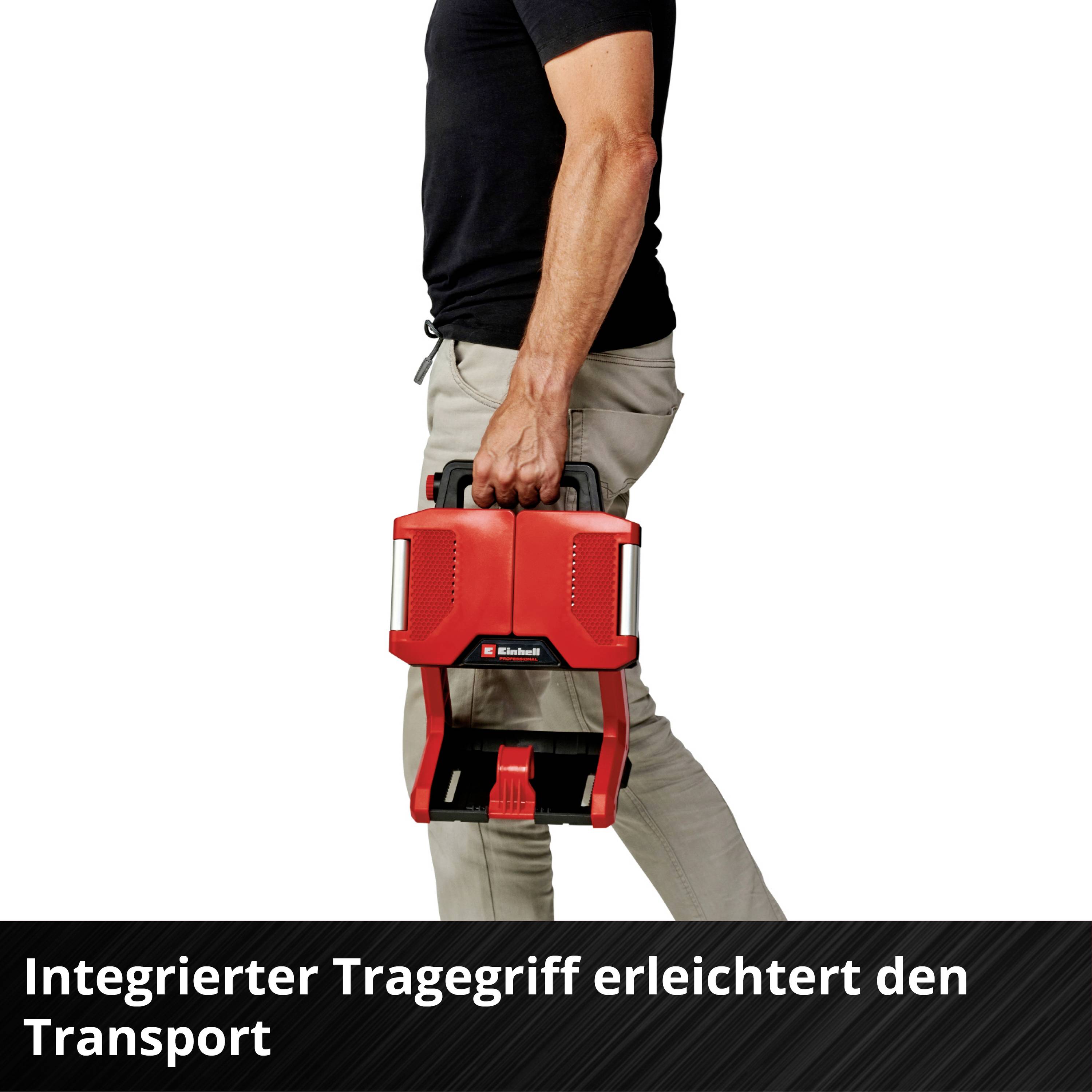 Person hält einen Werkzeugkoffer mit integriertem Tragegriff. Text im Bild: 'Integrierter Tragegriff erleichtert den Transport'.