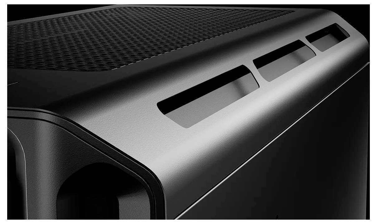 Nahaufnahme eines schwarzen Computergehäuses mit Lüftungsschlitzen an der Oberseite, moderne und minimalistische Gestaltung.