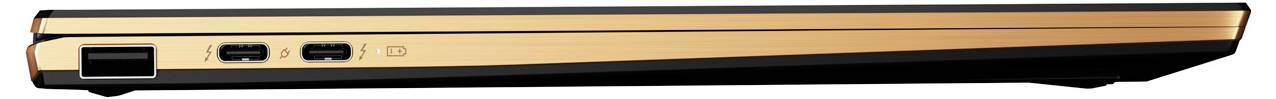 Ein geschlossenes, schlankes Laptop in brauner Farbe von der Seite; zeigt zwei USB-Anschlüsse.