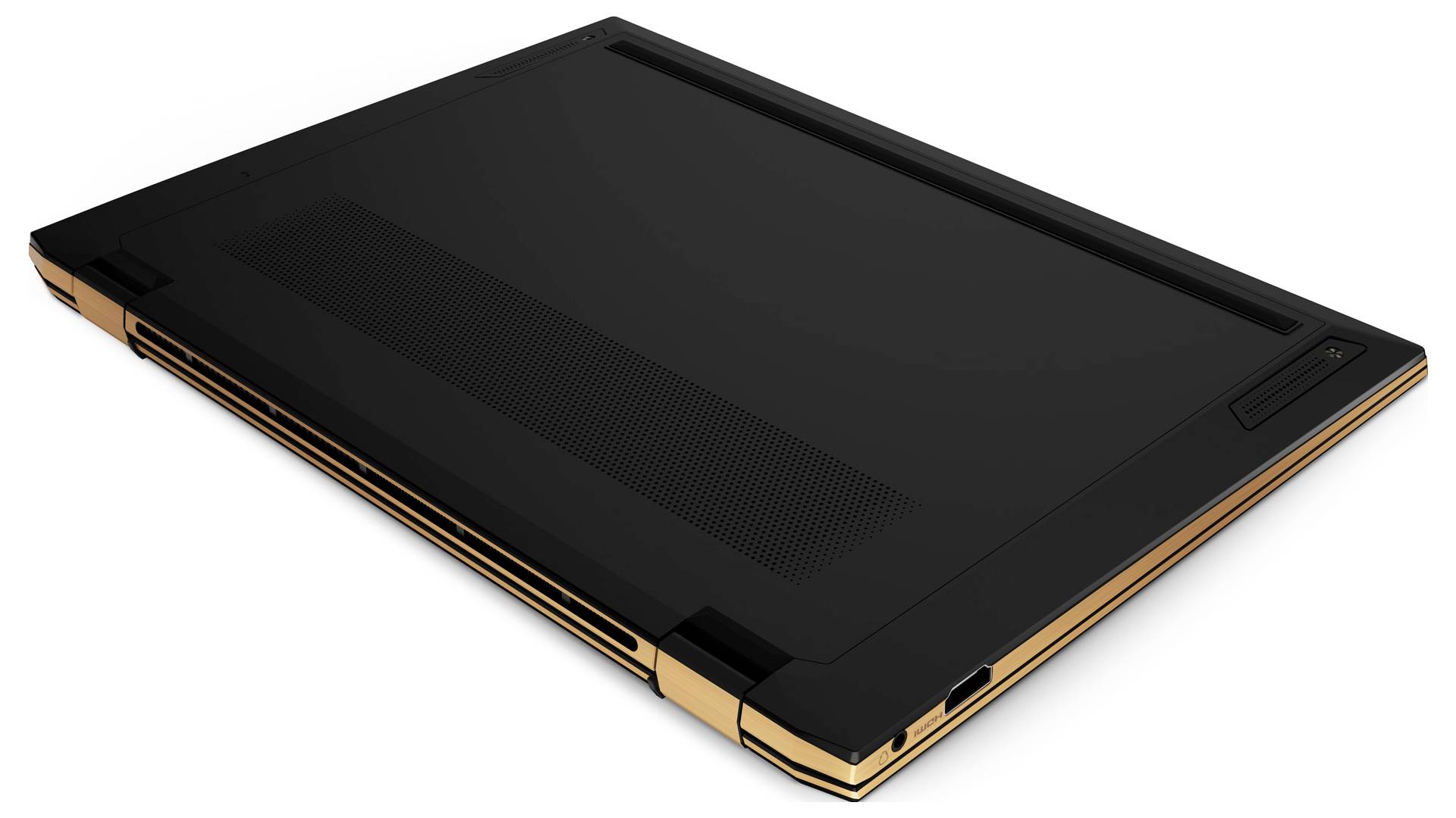 Geschlossener schwarzer Laptop mit goldenen Akzenten, von oben gesehen.