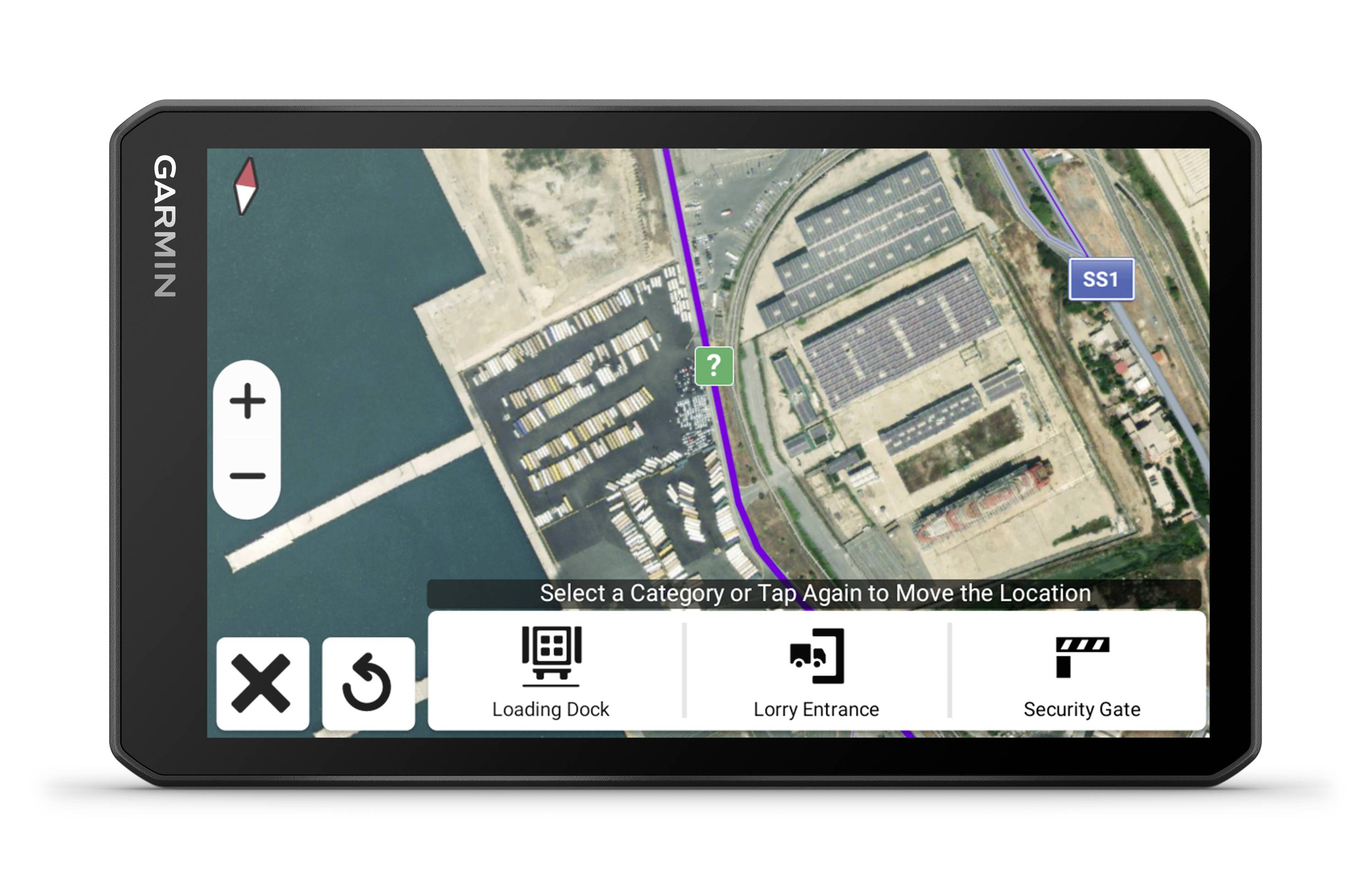 Navigationsgerät zeigt Satellitenansicht eines Hafens mit markierten Bereichen 'Ladedock', 'Lkw-Einfahrt' und 'Sicherheitstor'.