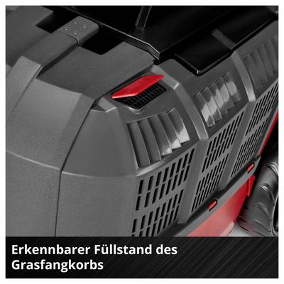 Nahaufnahme eines Rasenmäher-Grasfangkorbs mit sichtbarer Füllstandsanzeige; Text: 'Erkennbarer Füllstand des Grasfangkorbs'.