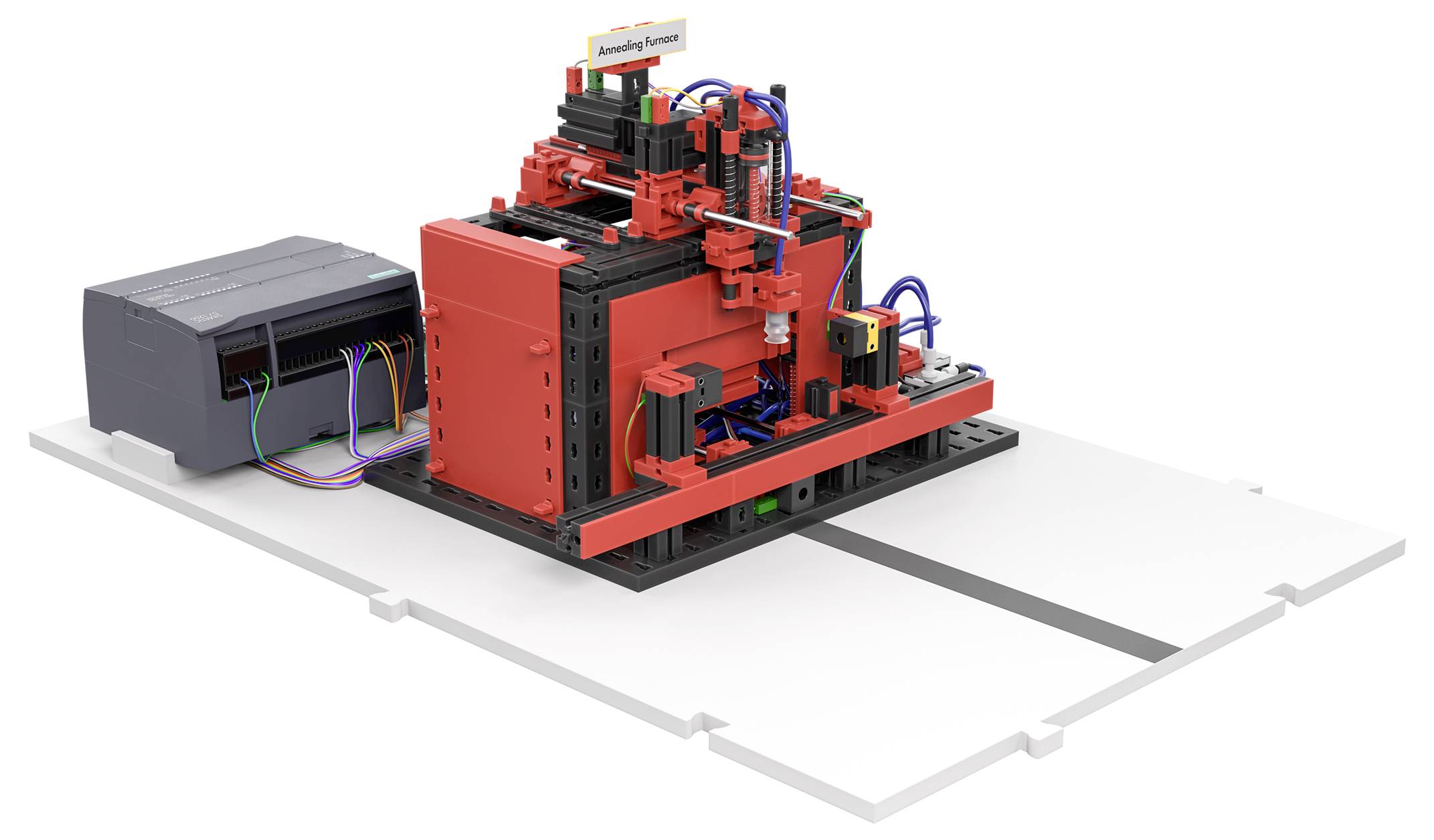 Eine Maschine aus Bausteinen mit leuchtend roten und schwarzen Teilen, verbunden mit einem grauen Kasten durch bunte Kabel, auf einer weißen Basis.