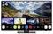 24-Zoll-Fernseher mit 'webOS Hub', zeigt eine Landschaft mit Wohnmobil sowie Streaming-Apps wie Netflix, Prime Video und Disney+.