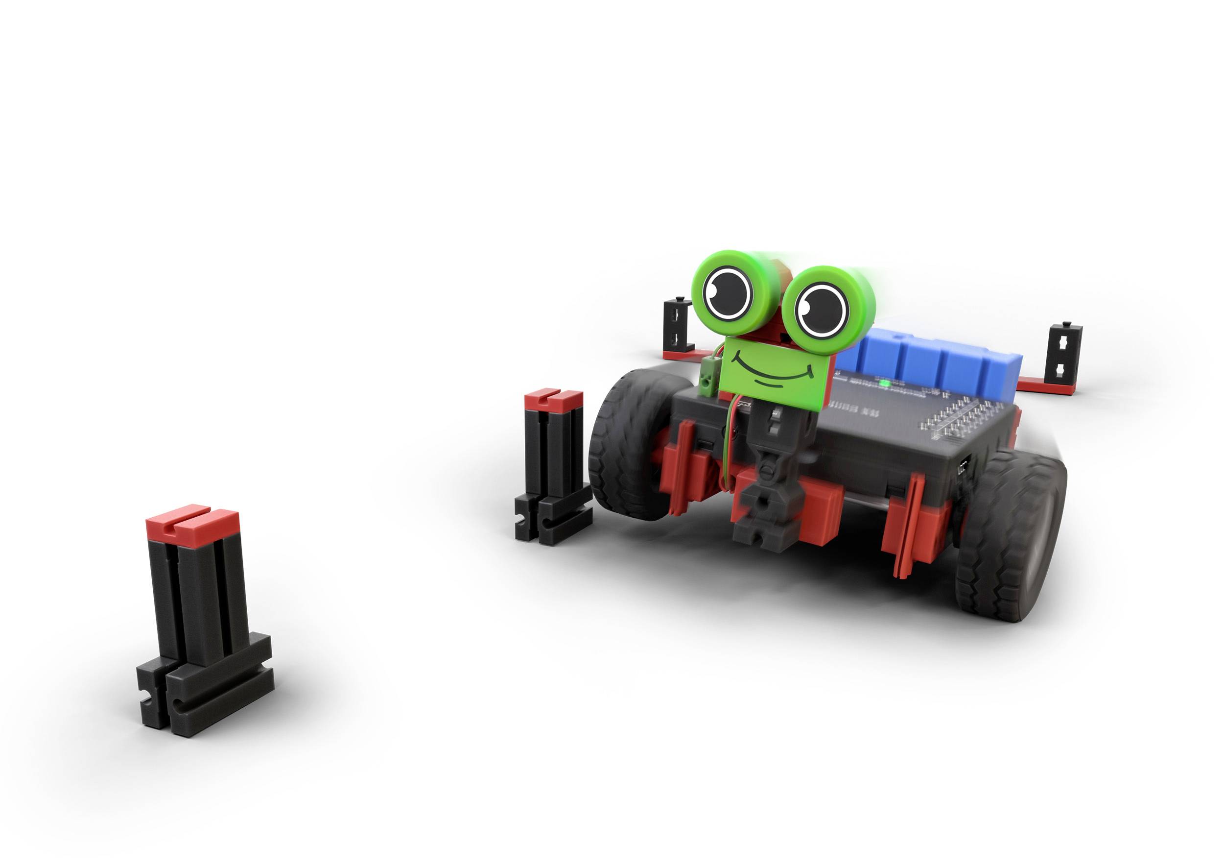 Ein kleiner, bunter Roboter mit großen grünen Augen fährt zwischen zwei schwarzen Hindernissen.