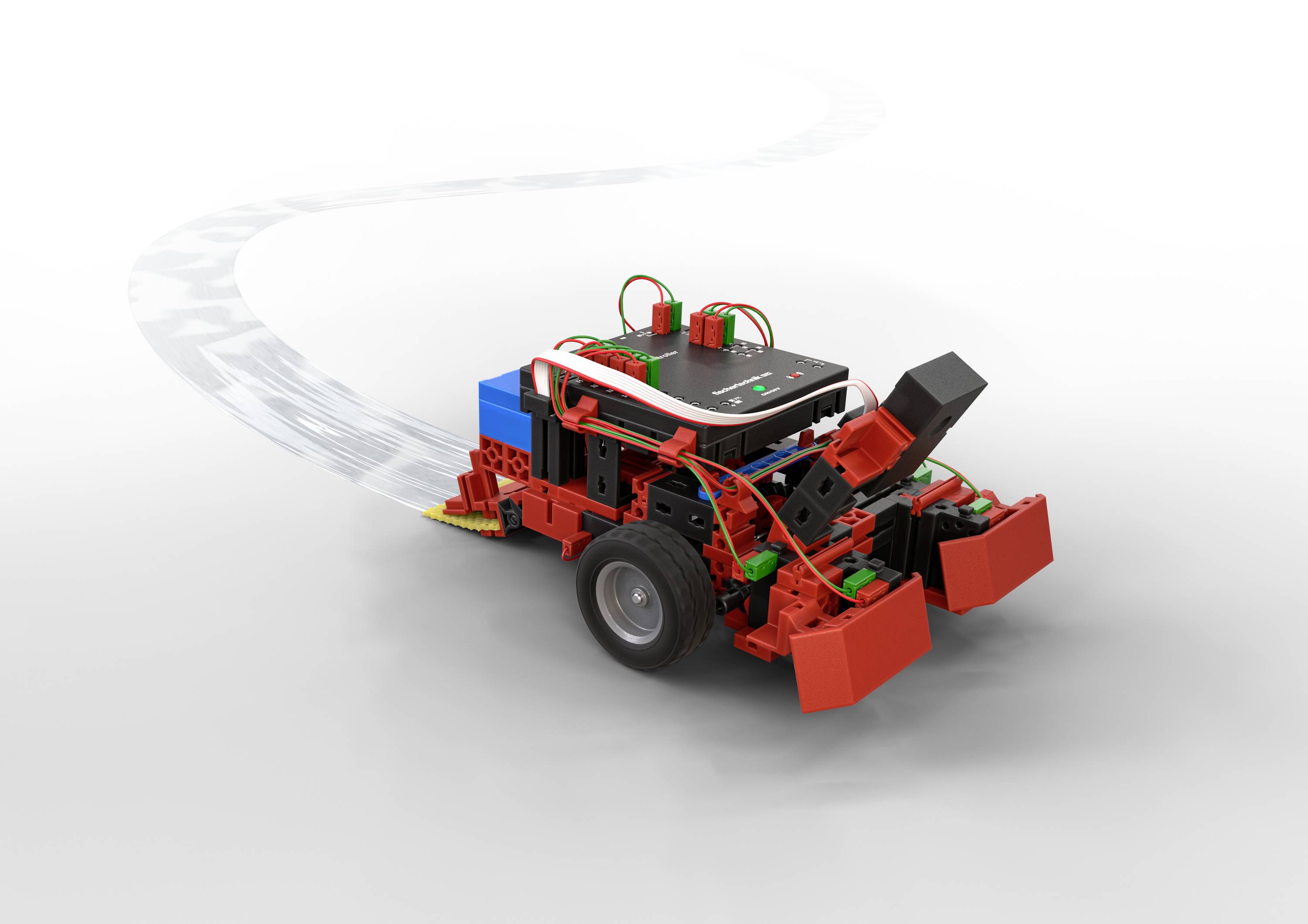 Ein kleiner, roter, programmierbarer Roboter folgt einer vorgegebenen Spur. Er hat Räder und sichtbare Kabelverbindungen.