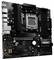 'Mainboard von ASRock', schwarze Leiterplatte mit zahlreichen Anschlüssen und Komponenten, einschließlich RAM-Slots und CPU-Sockel.