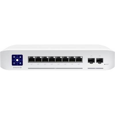 Ein weißer Netzwerk-Switch mit acht Ethernet-Ports und zwei zusätzlichen Anschlüssen. Links ist eine blaue Kontrollleiste zu sehen.