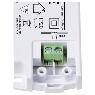 Ein weißes elektrisches Gerät mit der Aufschrift 'IP20 SELV Constant Voltage' und einem grünen Anschlussblock mit Schraubklemmen.