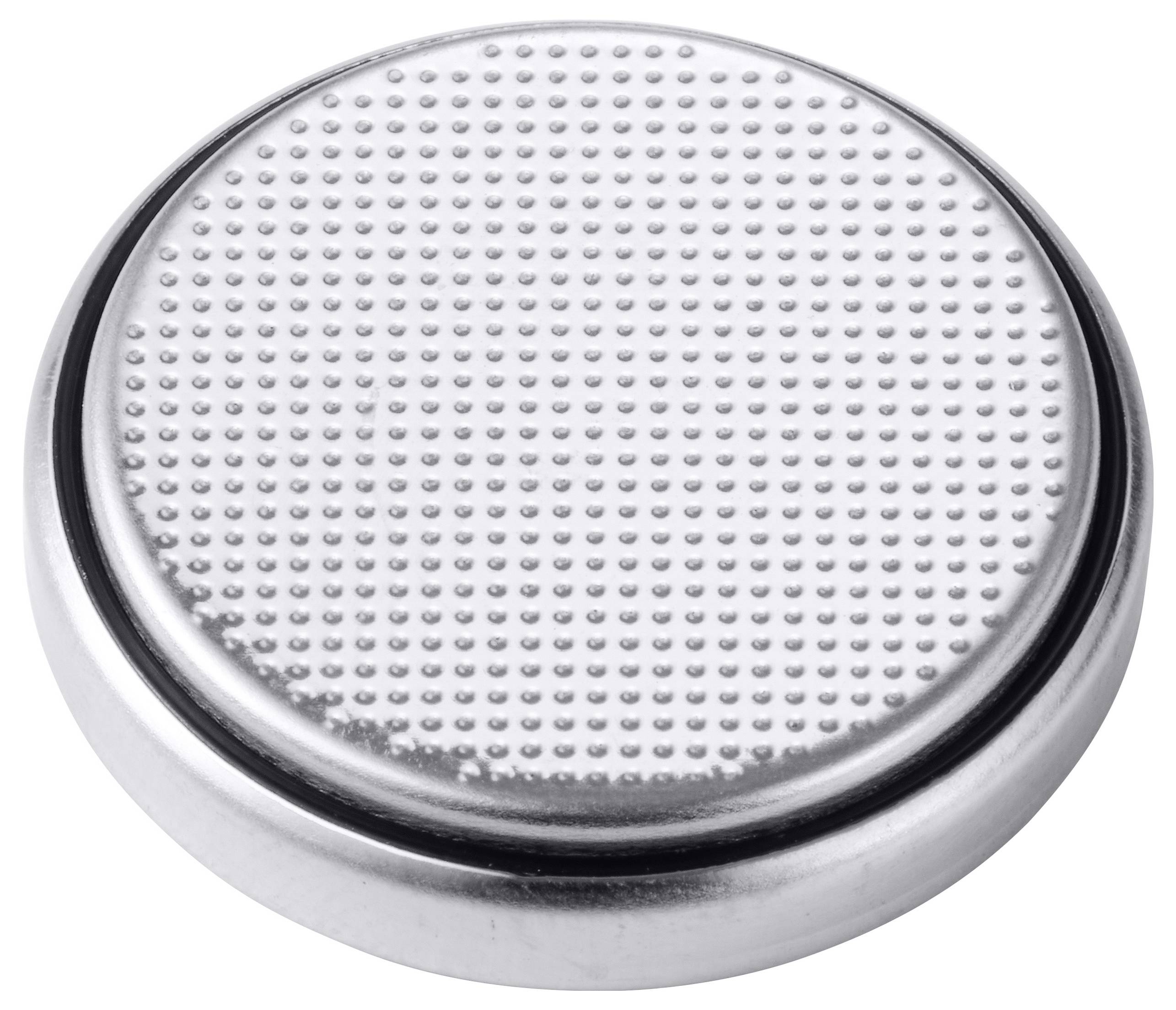 Eine runde silberne Metallplatte mit vielen kleinen, gleichmäßigen Noppen auf der Oberfläche.