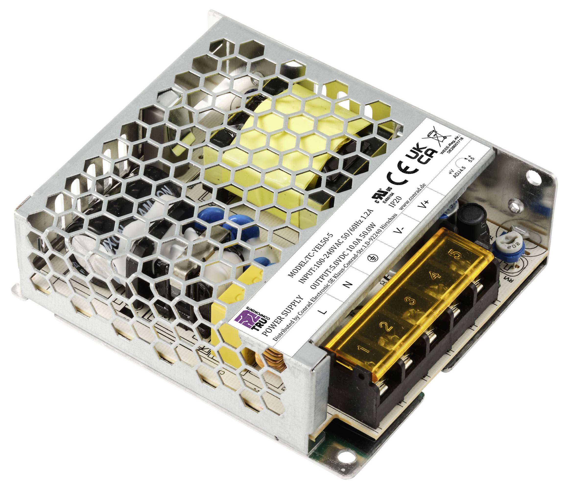 Ein Schaltnetzteil mit einem Metallgehäuse und einem gelben Anschlussblock, umgeben von einer Sechskantgitter-Abdeckung.