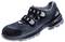 Dunkelblauer Sportschuh mit zwei Klettverschlüssen und grauer Sohle. Geeignet für leichte Outdoor-Aktivitäten.