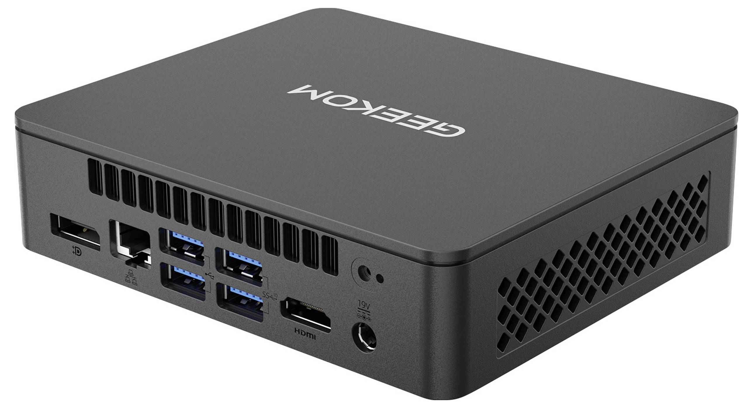 Kompakter Mini-PC in schwarzem Gehäuse mit mehreren USB-Anschlüssen, HDMI-Anschluss und Lüftungsschlitzen an der Seite.