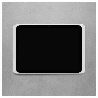 Ein Tablet mit schwarzem Bildschirm und weißem Rahmen auf grauer Oberfläche.