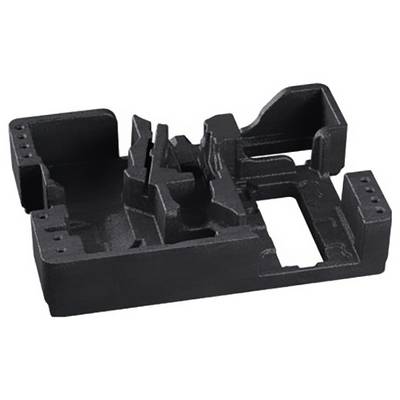 Ein dunkles, rechteckiges Maschinenteil mit komplexen Formen und Aussparungen, möglicherweise Teil eines größeren mechanischen Systems.