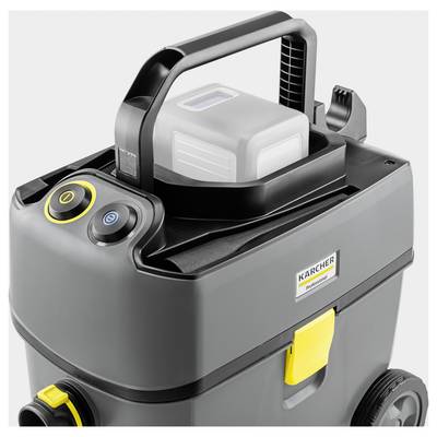 Industrieller Staubsauger mit robustem Griff und großer Batterie. Zwei Tasten in Gelb und Blau zur Steuerung. Marke 'Karcher'.