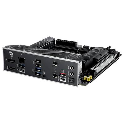 Eine schwarze Computerplatine mit verschiedenen Anschlüssen wie USB, HDMI und Audioeingängen, auf der Kühlkörper sichtbar sind.