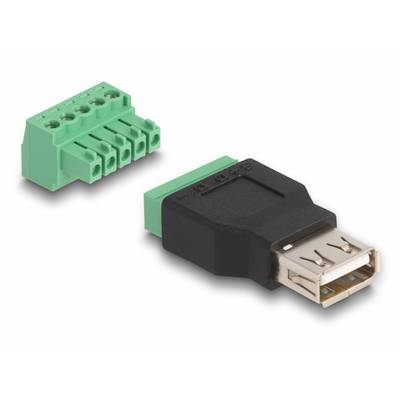 Ein grüner Steckverbinder neben einem USB-Adapter. Der Adapter hat einen schwarzen Körper und eine USB-Buchse.