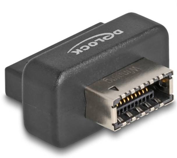 Rechteckiger Adapter mit mehrpoligem Stecker, seitlich 'Delock'-Logo. Verbindet verschiedene elektronische Geräte miteinander.