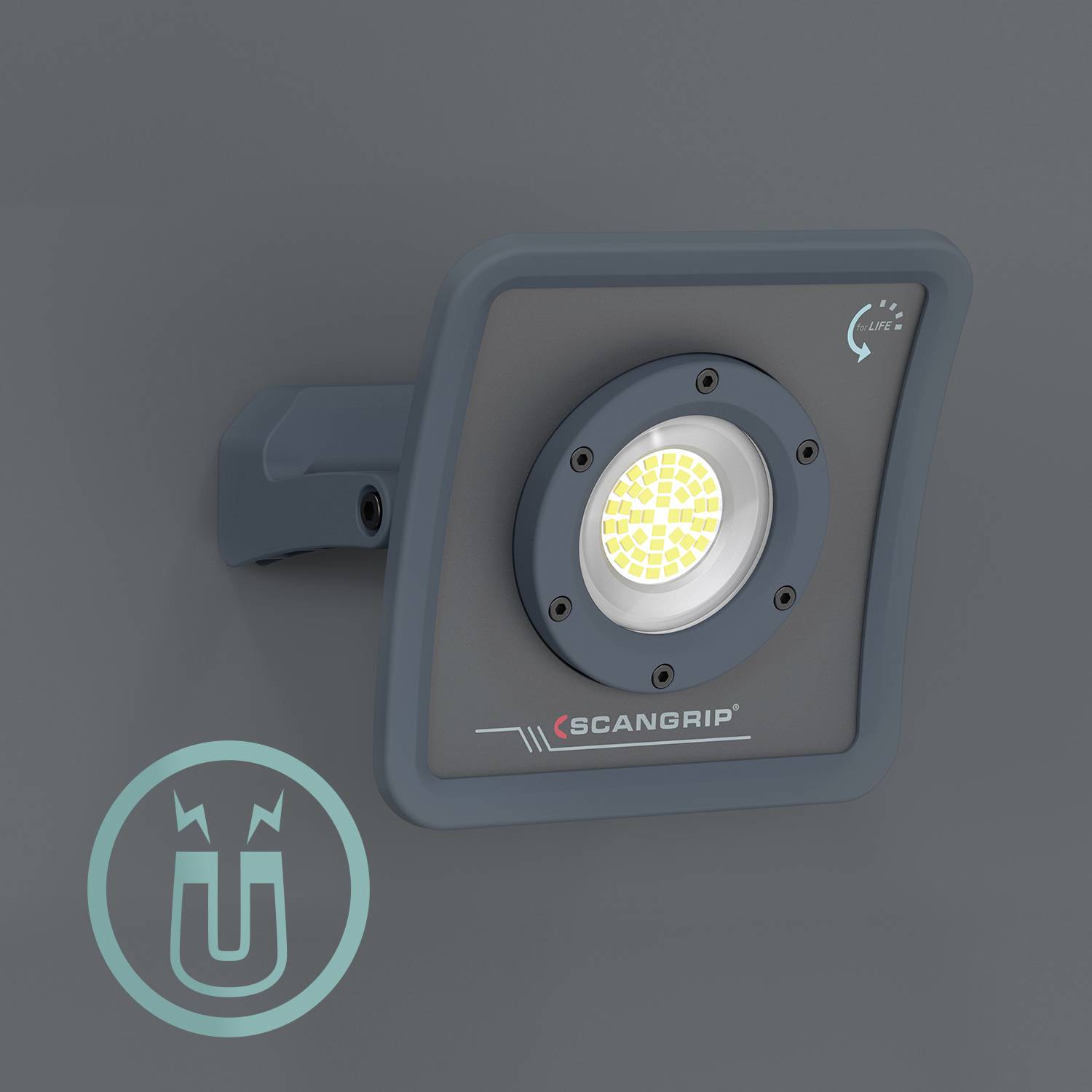 Graues, quadratisches LED-Arbeitslicht mit Magnetfunktion von Scangrip vor grauem Hintergrund. Ein Magnet-Symbol ist unten links sichtbar.