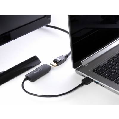 'Ein Laptop ist per Mini-DisplayPort-Kabel mit einem externen Monitor verbunden, wobei ein Adapter zwischengeschaltet ist.'