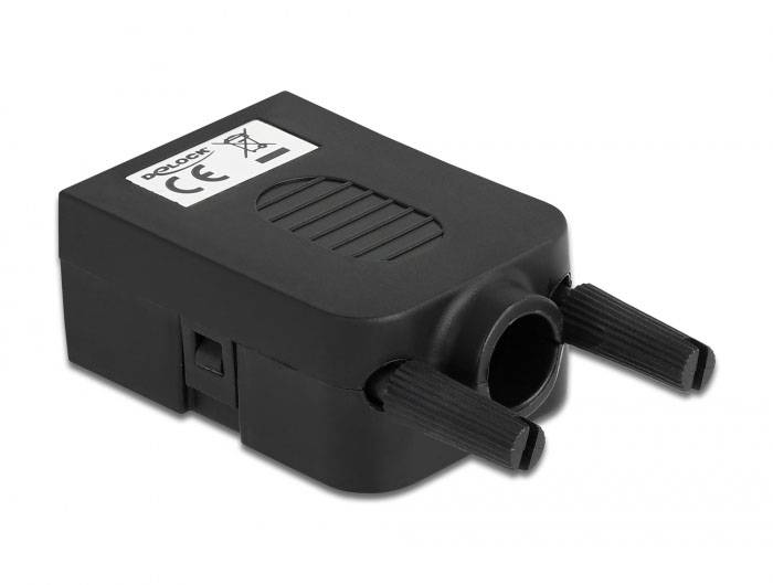 Ein schwarzer Adapter mit zwei Anschlussstiften und einem Etikett mit 'CE'-Kennzeichnung, wahrscheinlich für elektronische Geräte.