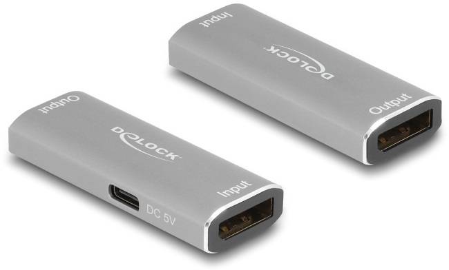 Zwei silberne HDMI-Repeater der Marke Delock. Jeder verfügt über einen HDMI-Eingang und -Ausgang sowie einen DC 5V Anschluss.