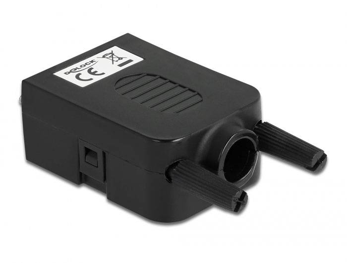 Ein schwarzer, rechteckiger elektrischer Adapter mit CE-Kennzeichnung und zwei herausstehenden Steckern.
