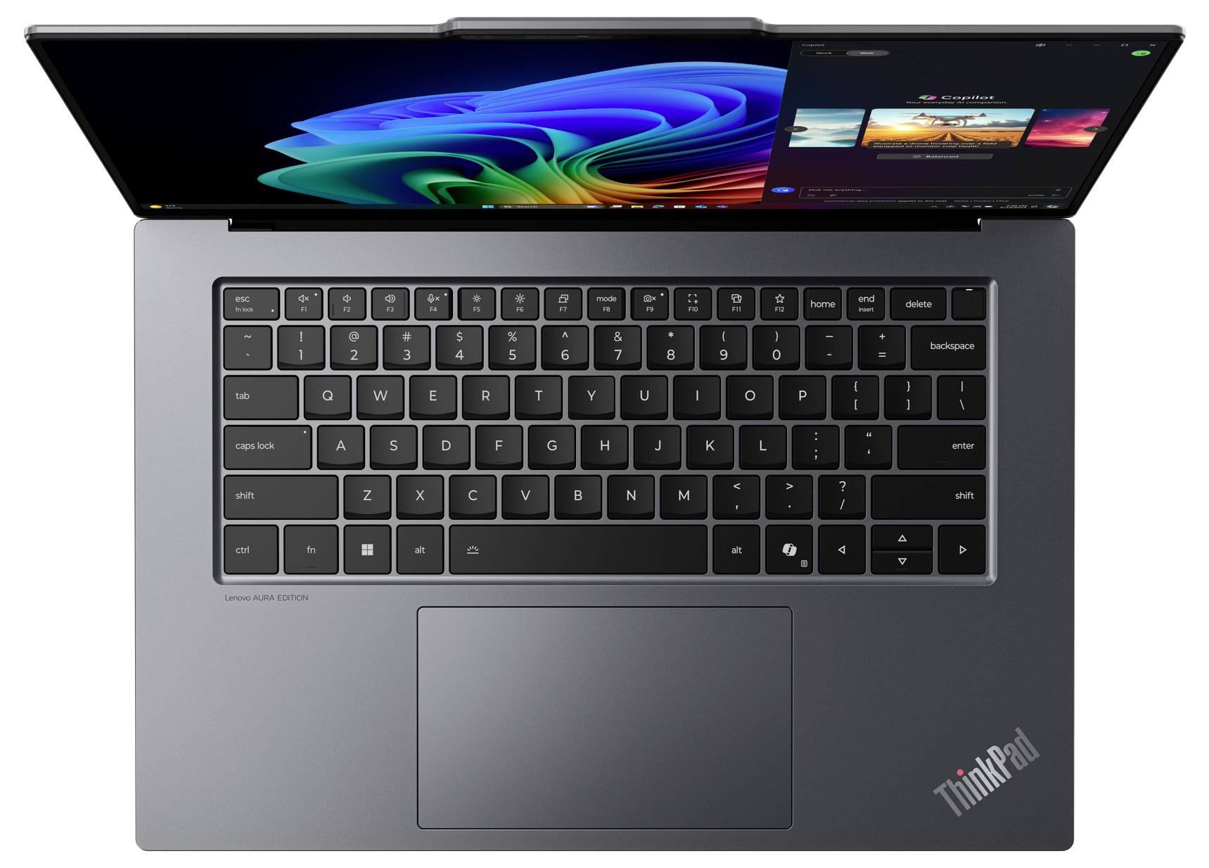 Laptop mit offenem Bildschirm, das bunte Grafiken und ein Programmfenster zeigt. Im Fokus steht die schwarze Tastatur mit Touchpad.