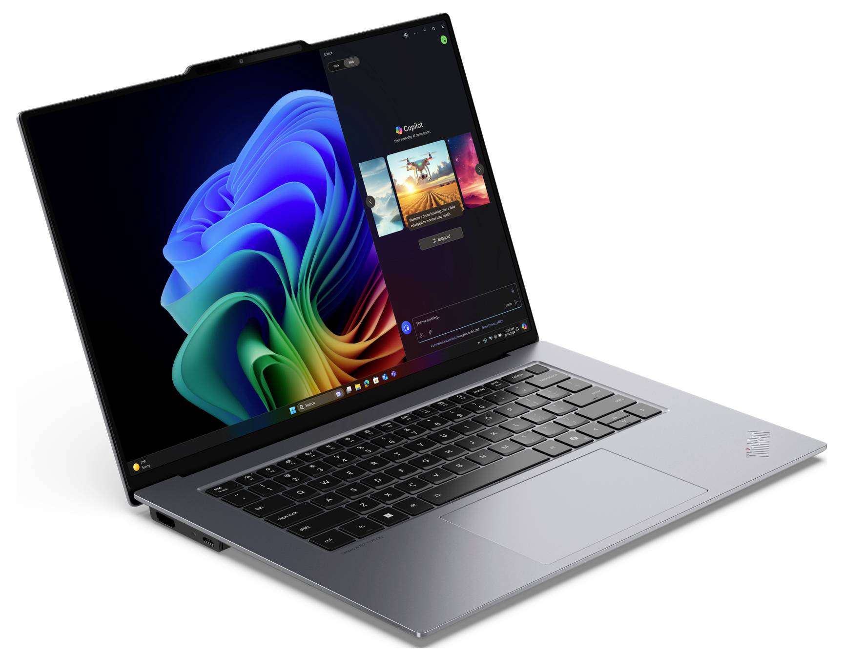 Ein moderner Laptop mit geöffneter Anwendung, die ein farbenfrohes Hintergrundbild anzeigt. Der Bildschirm zeigt das Windows-Logo.