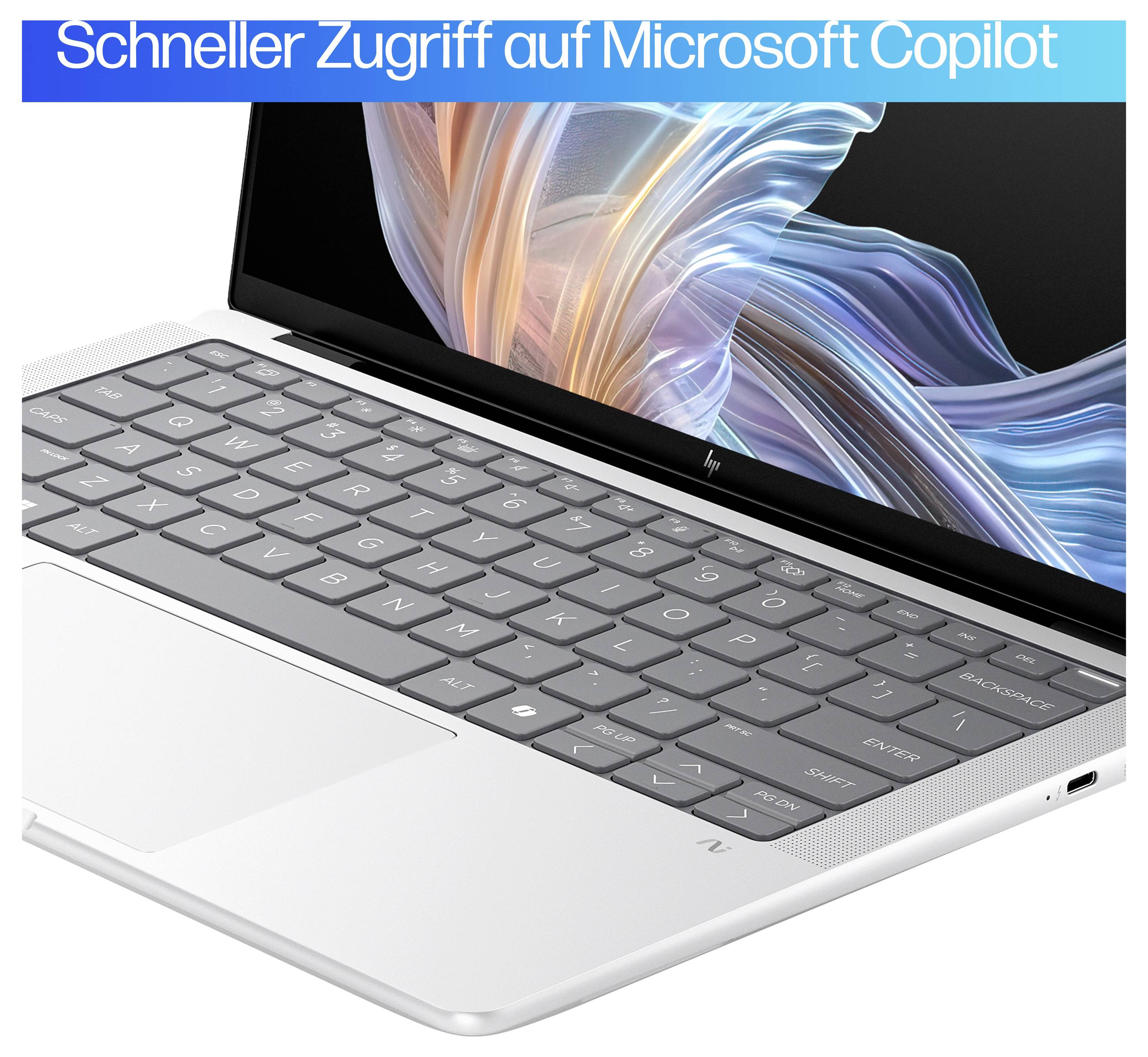 Ein Laptop mit bunter Bildschirmanzeige. Oben steht 'Schneller Zugriff auf Microsoft Copilot'.