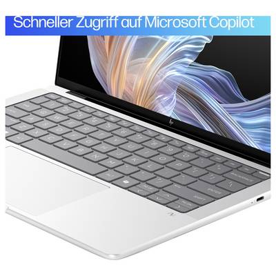 Ein Laptop mit bunter Bildschirmanzeige. Oben steht 'Schneller Zugriff auf Microsoft Copilot'.