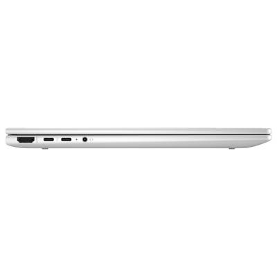 Geschlossener silberner Laptop von der Seite mit sichtbaren Anschlüssen: HDMI, zwei USB-C und Kopfhörerbuchse.