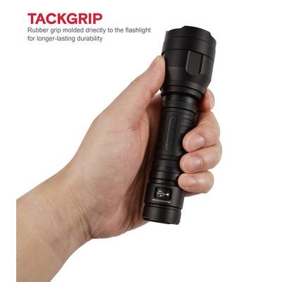 Hand hält eine schwarze Taschenlampe mit gummiertem Griff. Oben links steht 'TACKGRIP' mit Hinweis auf die langlebige Gummibeschichtung.