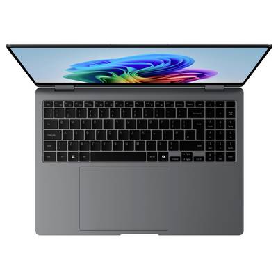 Ein Laptop von oben, mit einer offenen, bunten Bildschirmdarstellung. Die Tastatur ist sichtbar mit einem großen Trackpad darunter.