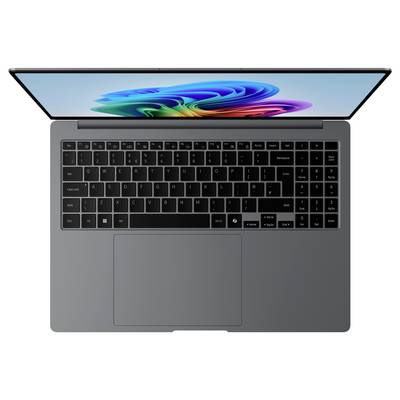 Ein Laptop von oben gezeigt. Der Bildschirm zeigt ein buntes, abstraktes Muster. Die Tastatur hat ein glattes, modernes Design.