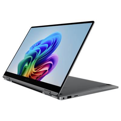Ein moderner Laptop in Tablet-Modus mit einem bunten, wellenförmigen Hintergrundbild auf dem Bildschirm, stehend auf einem Tisch.