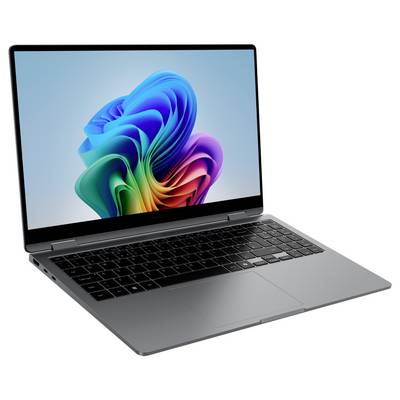 Ein silberner Laptop mit schwarzer Tastatur. Auf dem Bildschirm zeigt sich ein farbenfrohes, abstraktes Bild vor blauem Hintergrund.