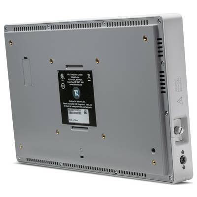 Metallgehäuse mit einer schwarzen Identifikationsplatte in der Mitte. Aufkleber zeigt Kontaktinformationen und Herstellungsland.