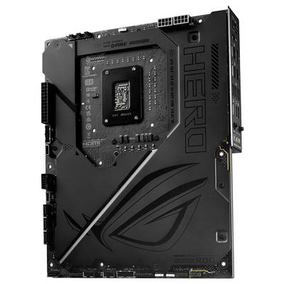 Schwarzes Motherboard mit dem Schriftzug 'HERO' und 'ROG'-Logo, geeignet für leistungsstarke Computer, zeigt Anschlüsse und Chipsatz.