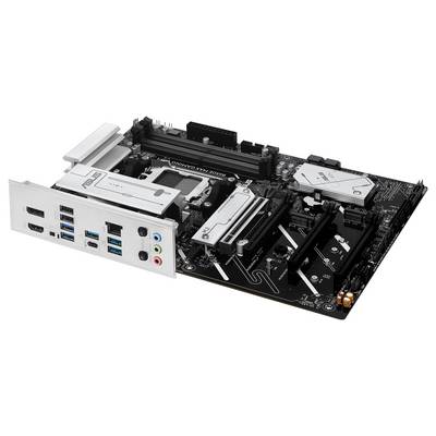 Ein schwarzes Computer-Motherboard mit verschiedenen Anschlüssen, darunter USB-Ports, Audiobuchsen und PCIe-Steckplätze, liegt auf einer weißen Unterlage.