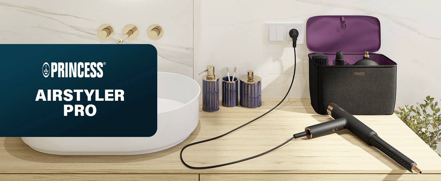 'Princess Airstyler Pro' auf einem Badezimmertisch neben einem Waschbecken und einer Schachtel mit lila Innenfutter. Produkte sind angeschlossen.