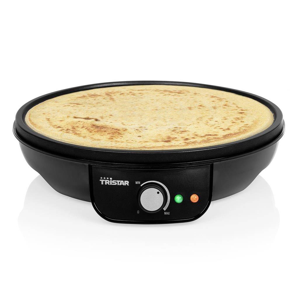 Pancake-Maker mit runder Heizplatte, Bräunungsgradregler und zwei Kontrollleuchten. Eine goldbraune Crepe liegt auf der Platte.