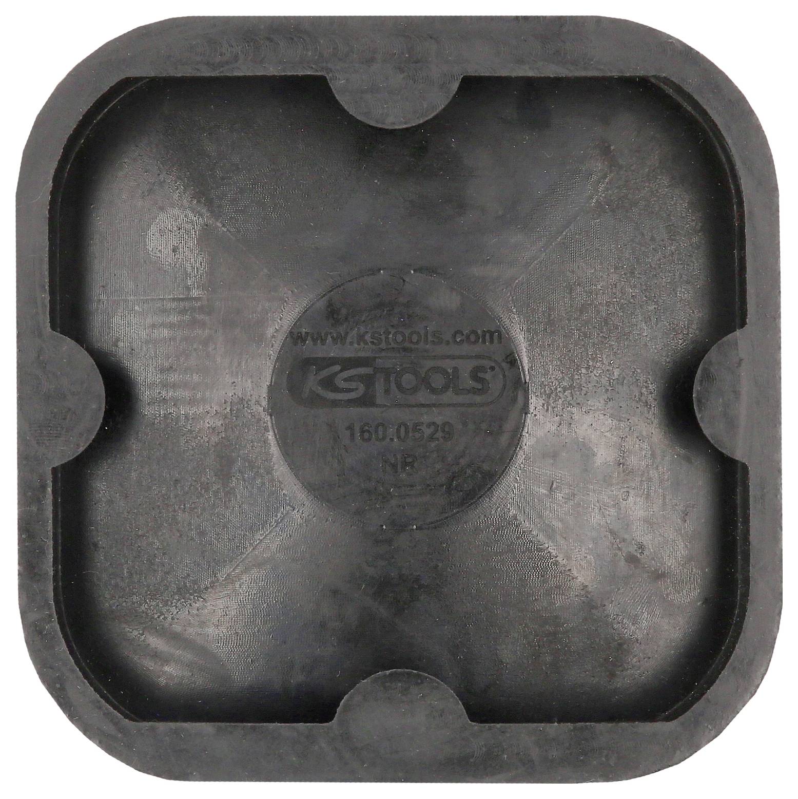 Ein schwarzer, quadratischer Gummiblock mit abgerundeten Ecken und einem mittigen Kreislogo mit dem Text 'KS TOOLS'.