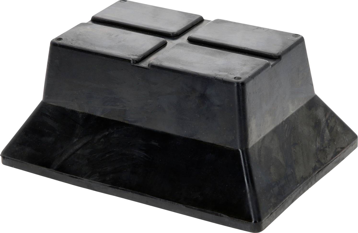 Ein schwerer, rechteckiger Gummipuffer mit abgeschrägten Kanten, verwendet zur Stoßdämpfung in industriellen Anwendungen.