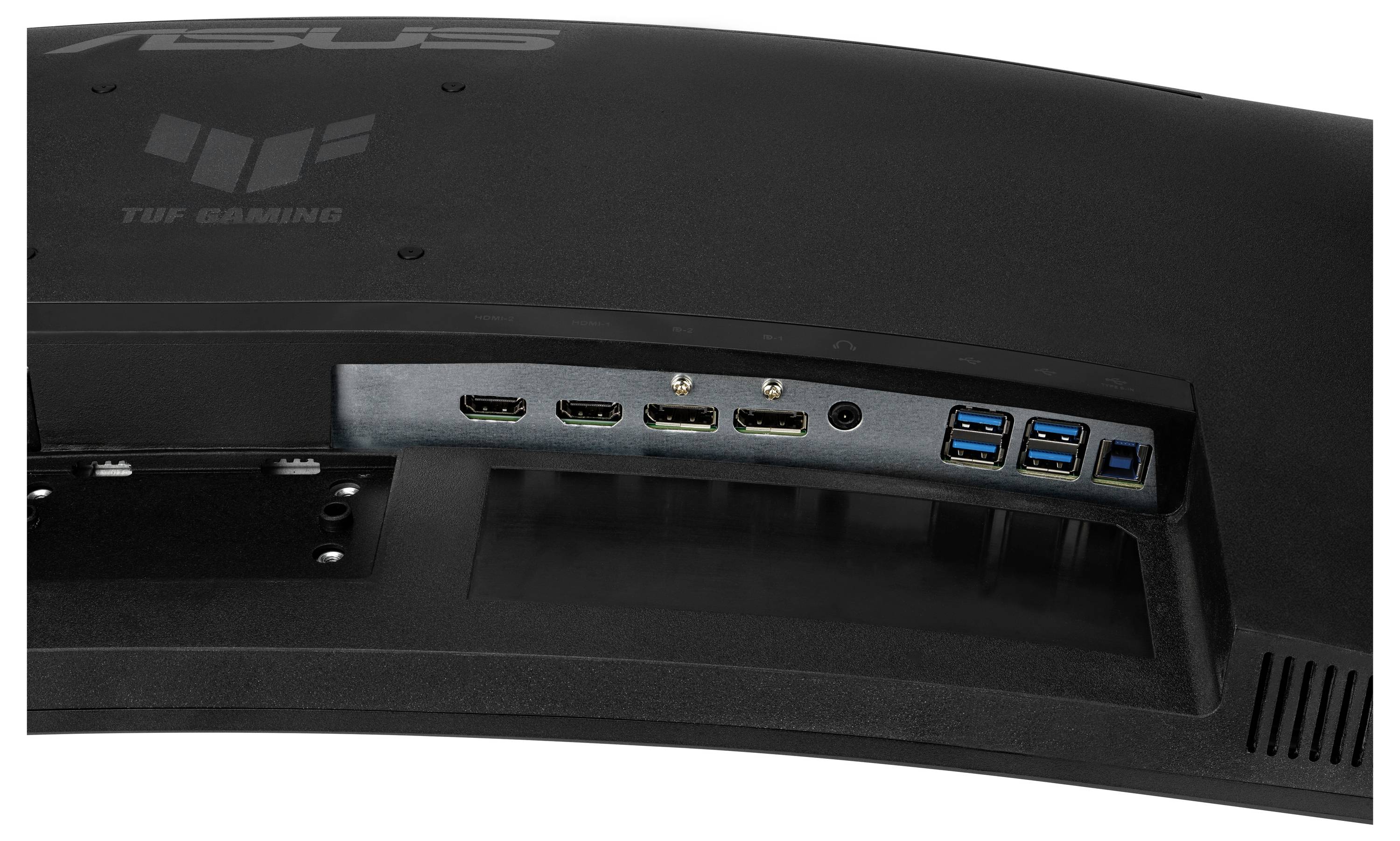 Rückseite eines Monitors mit vier HDMI-Anschlüssen und vier USB-Anschlüssen. Markenlogo 'TUF Gaming' sichtbar oben links.