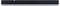 Schwarze und weiße Soundbar, rechteckig, minimalistisch gestaltet. Sie ist gegen einen neutralen Hintergrund platziert.