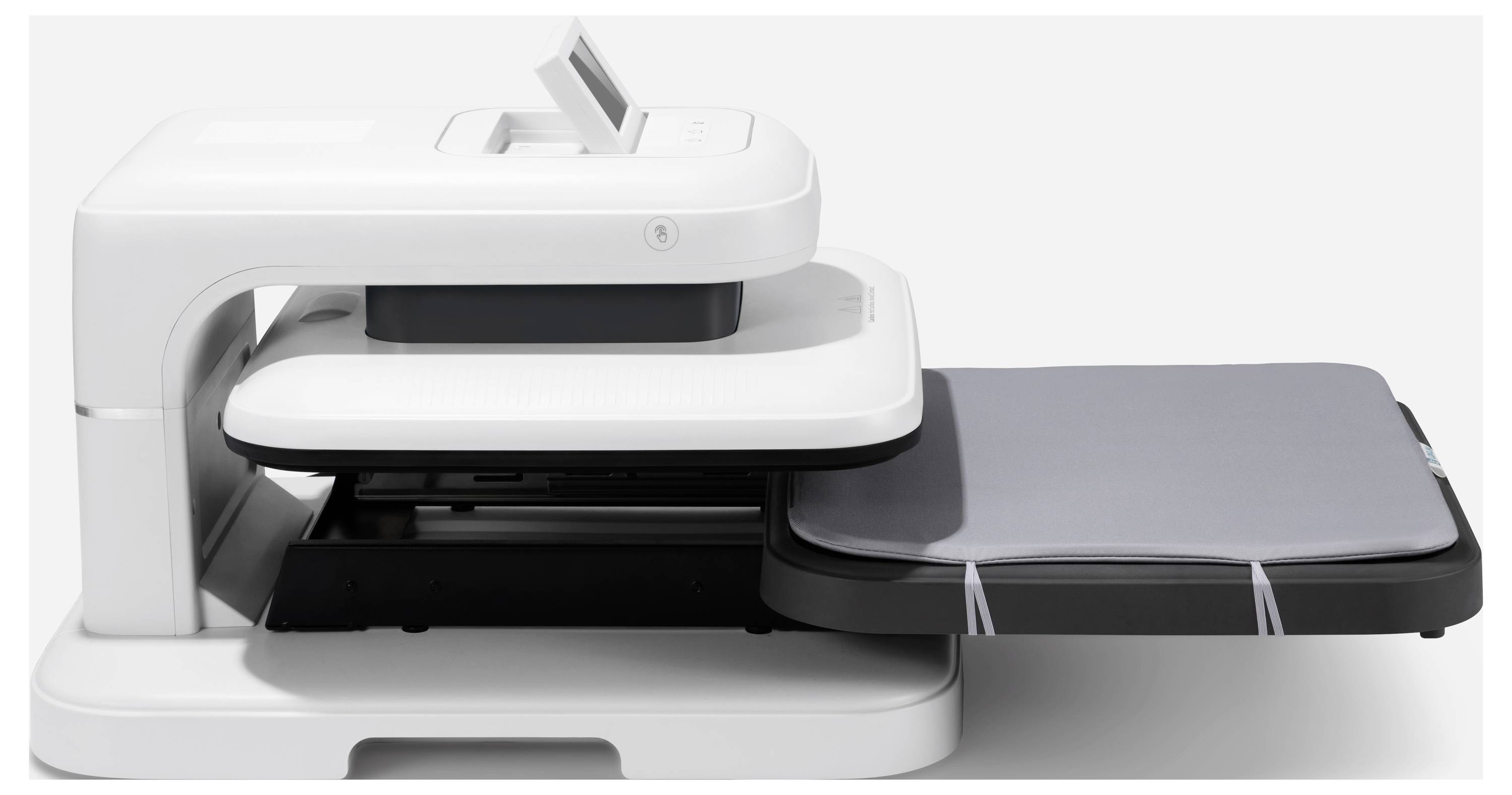 Ein weißes, modernes Gerät mit einer grauen Ablagefläche, möglicherweise ein Scanner oder Drucker, vor einem schlichten Hintergrund.