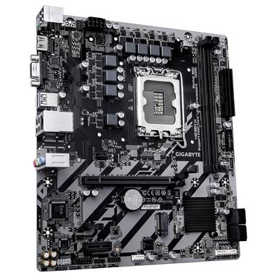 Ein schwarz-graues Motherboard mit zahlreichen Anschlüssen, einem CPU-Sockel in der Mitte und mehreren RAM-Steckplätzen auf der rechten Seite.